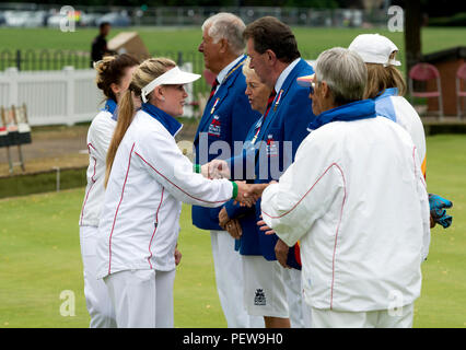 Players and umpires shaking hands before the triples final at the national women`s lawn bowls championships, Leamington Spa, UK Stock Photo